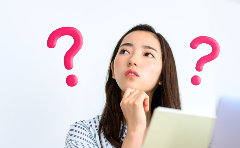 親知らずはいつ頃生えてくるのか考える女性